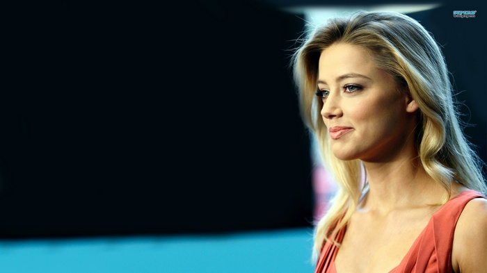 Amber Heard in profile with blonde hair