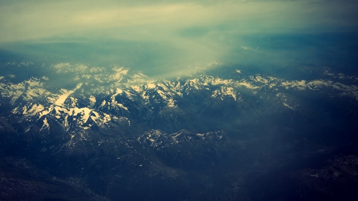 Snow-capped mountains seen from above