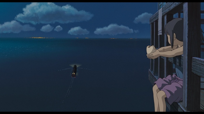Spirited Away: Girl on balcony overlooking ocean at night