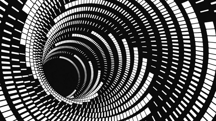 Abstract spiral tunnel of white blocks