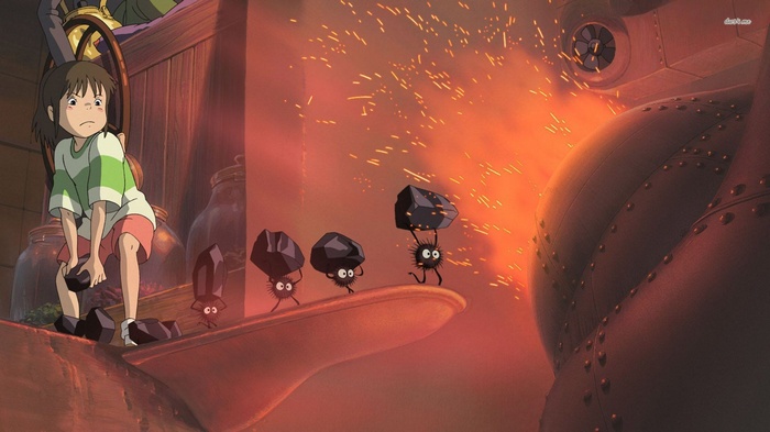 Chihiro and soot sprites carrying coal in Spirited Away