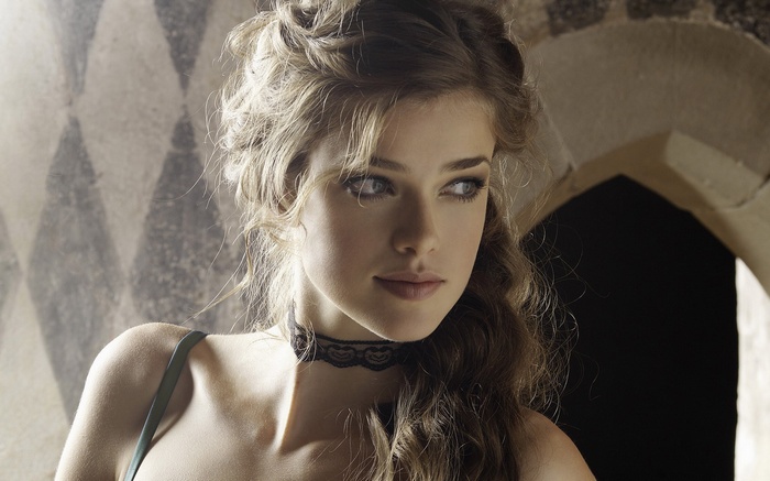 Julia Saner portrait with long hair and choker
