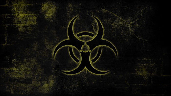 Biohazard symbol on a dark textured background