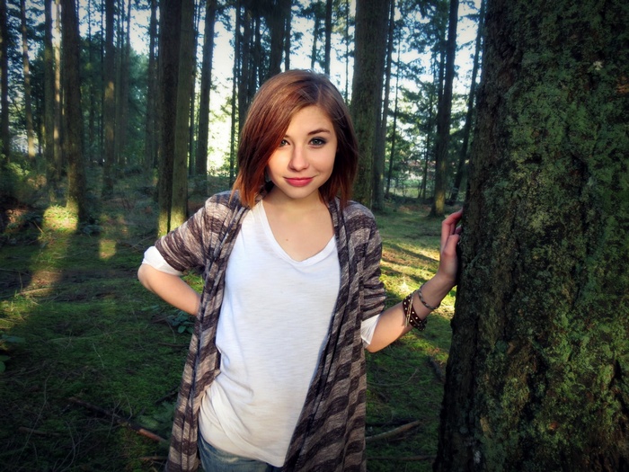 Woman in a forest with trees