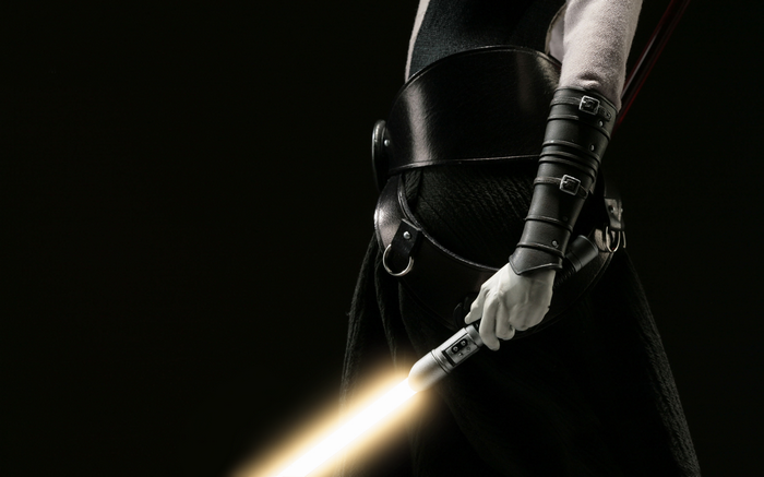 Star Wars Sith holding a lightsaber