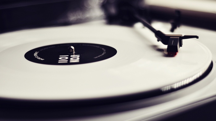 White vinyl record on a turntable