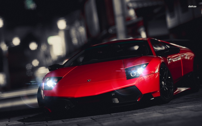 Red Lamborghini Murcielago parked at night