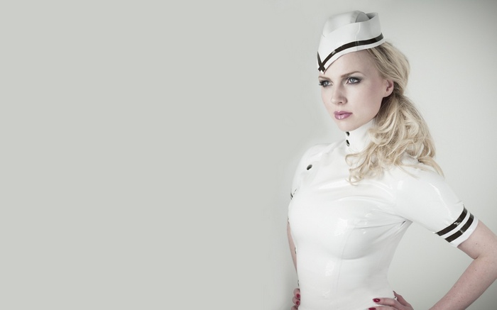 Ancilla Tilia in a white uniform and hat