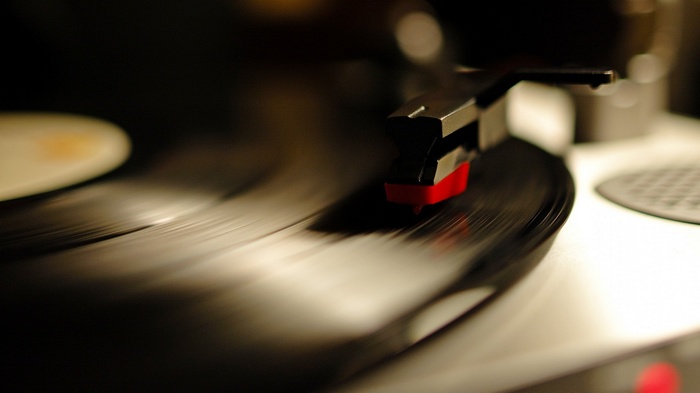 Close-up of a turntable needle on a vinyl record