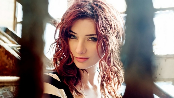 Susan Coffey with red hair and green eyes