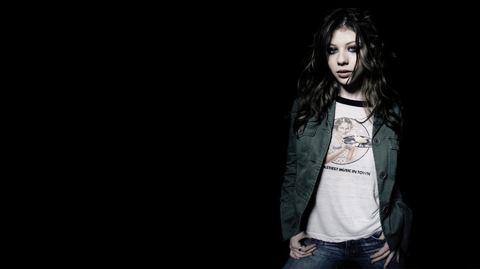 Michelle Trachtenberg wearing a jacket and t-shirt