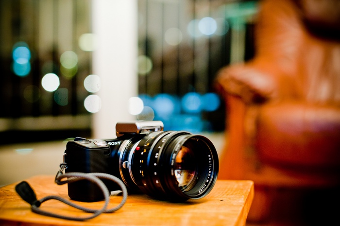 Sony camera with Noctilux lens and bokeh background
