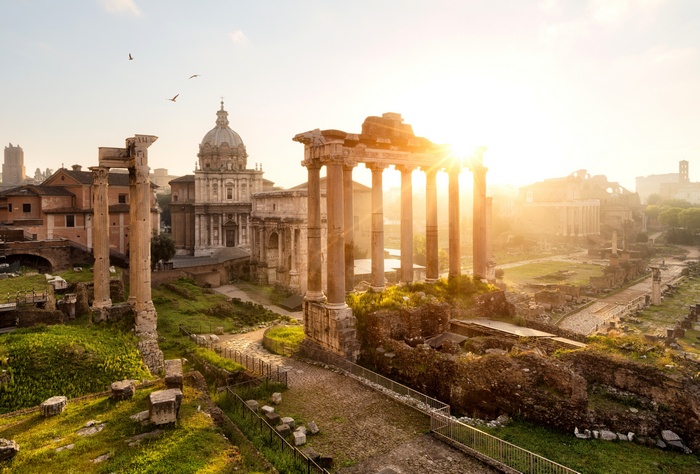 Roman Forum with Temple of Saturn at sunrise, Rome, Italy