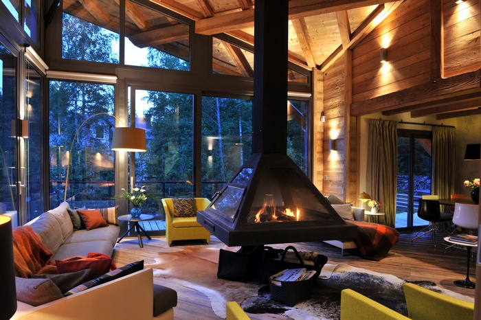 Cozy living room with fireplace and large windows