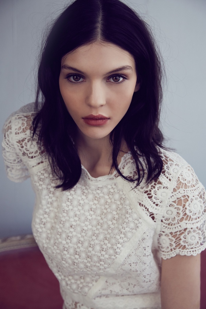 Kate Bogucharskaia in a white lace top