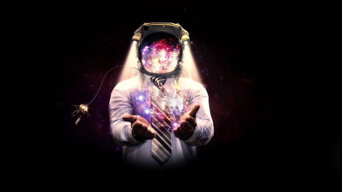 Astronaut in a suit with galaxy in helmet