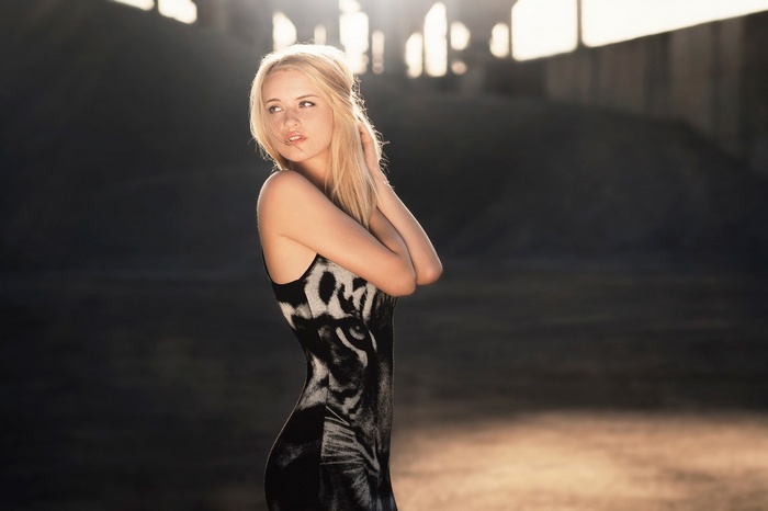 Blonde woman in a tiger print dress