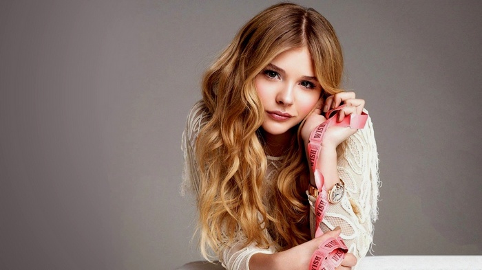 Chloë Grace Moretz with long wavy blonde hair