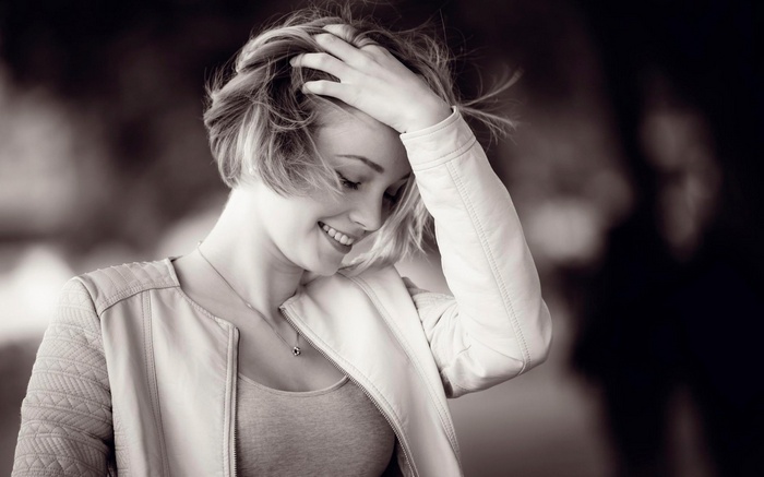 Monochrome portrait of a woman with short blonde hair