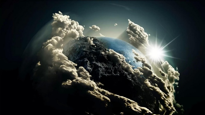 Planet with clouds and sun in space