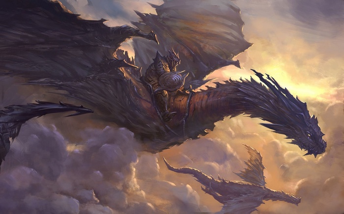 Two dragons flying through clouds at sunset