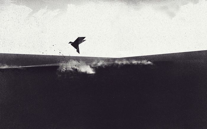 Origami bird flying over dark water