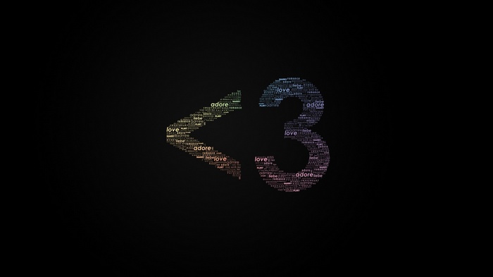 Love heart symbol made of words on black background