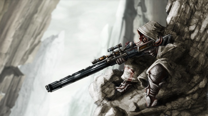 Sniper in camouflage with a rifle on rocks