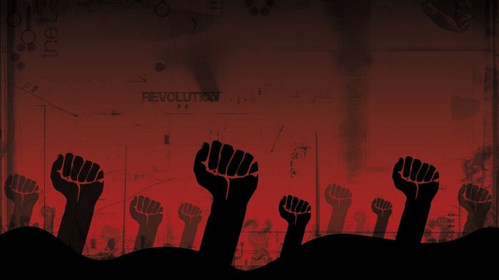 Black fists raised in silhouette against a red background with the word Revolution.