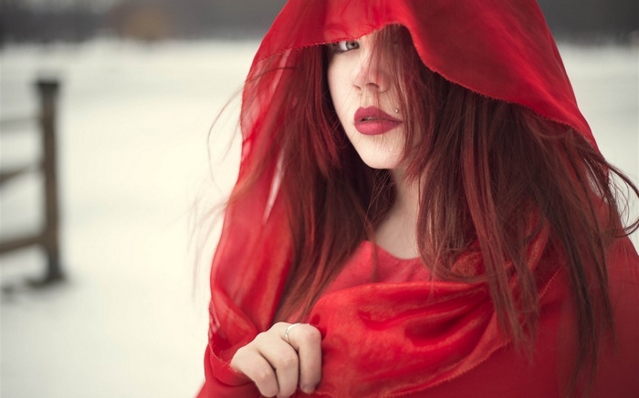 Woman with red hood and red lipstick