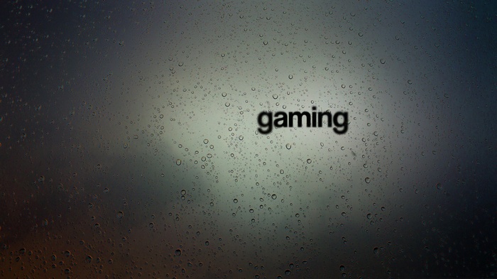 Gaming text on a rainy window