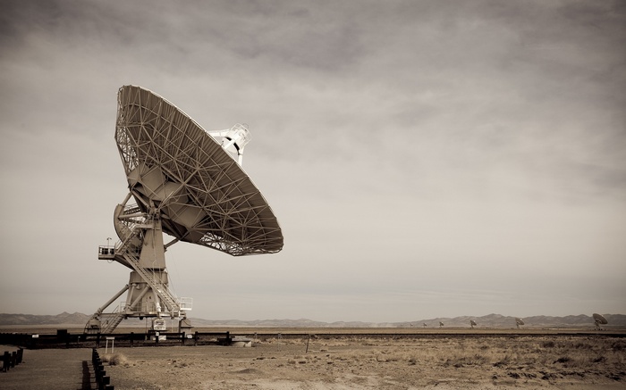 Radio telescope array in a desert landscape