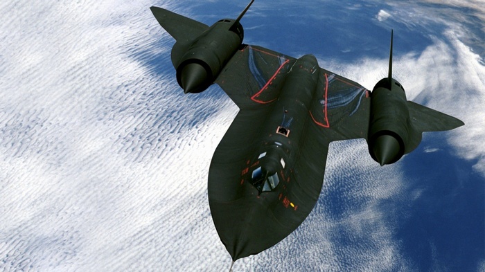 Lockheed SR-71 Blackbird flying over clouds