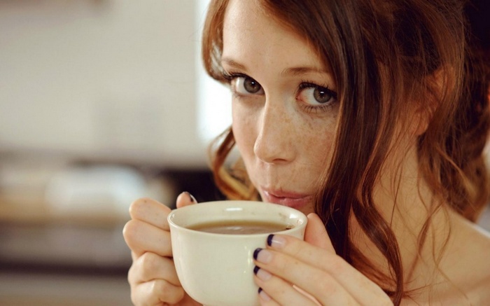 Charlotte Herbert drinking from a cup