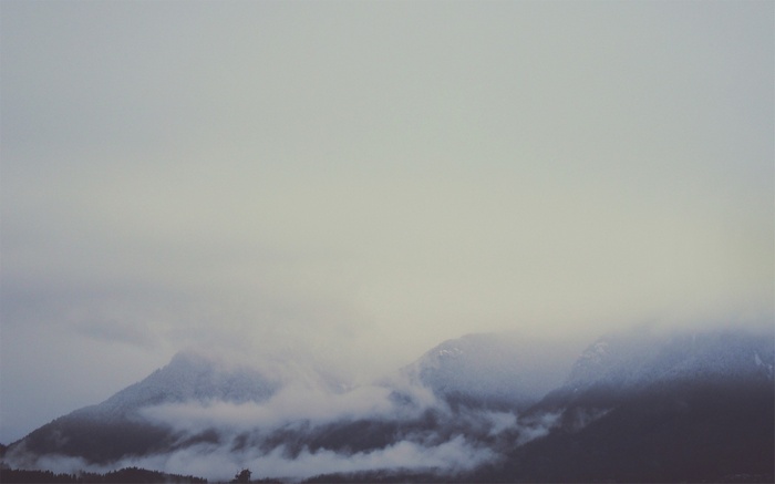 Misty mountains shrouded in clouds