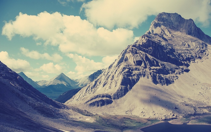 Mountain landscape with clouds and shadows