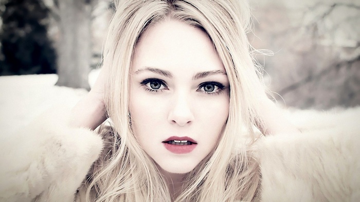 AnnaSophia Robb in a snowy outdoor portrait