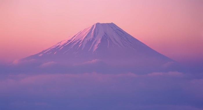 Mount Fuji volcano at sunset with clouds