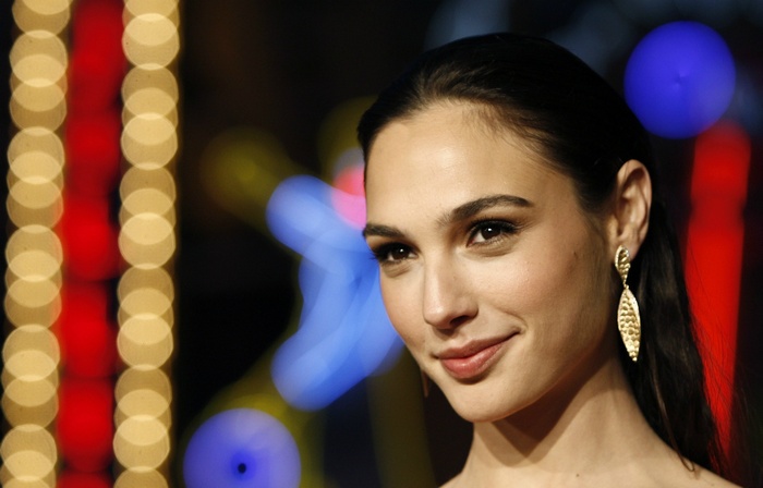 Gal Gadot smiling with bokeh lights