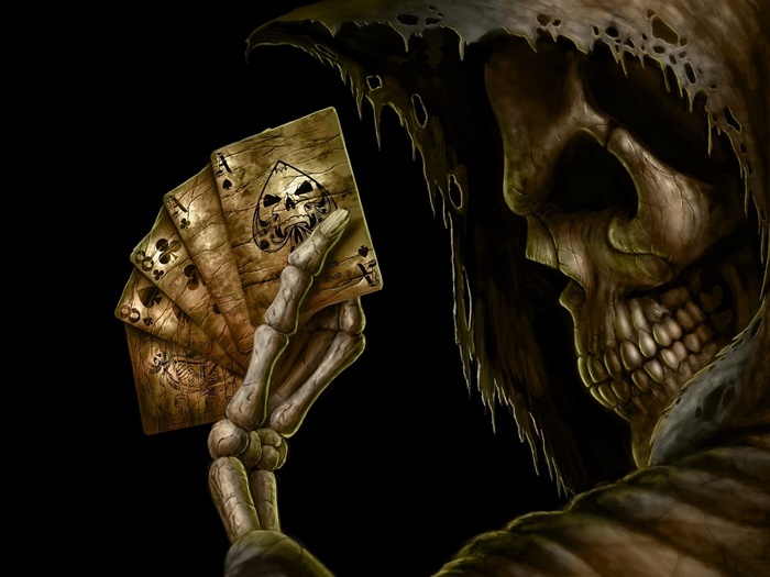 Grim Reaper holding playing cards with skull