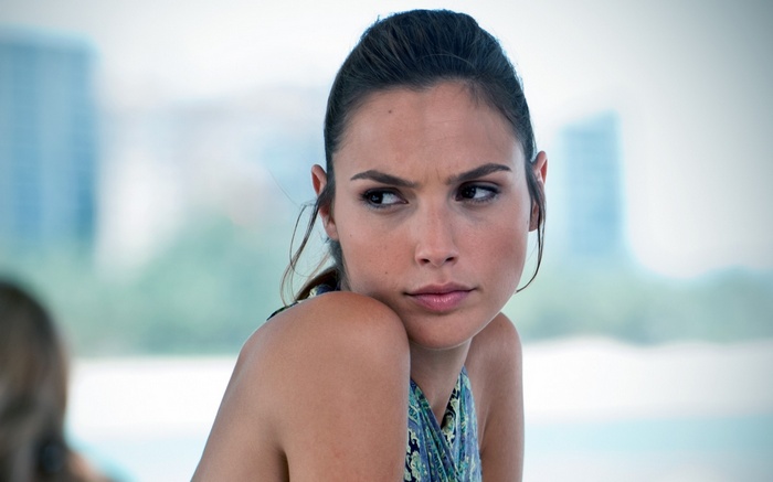 Gal Gadot looking away from the camera