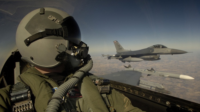 US Air Force F-16 Fighting Falcon pilots in cockpit
