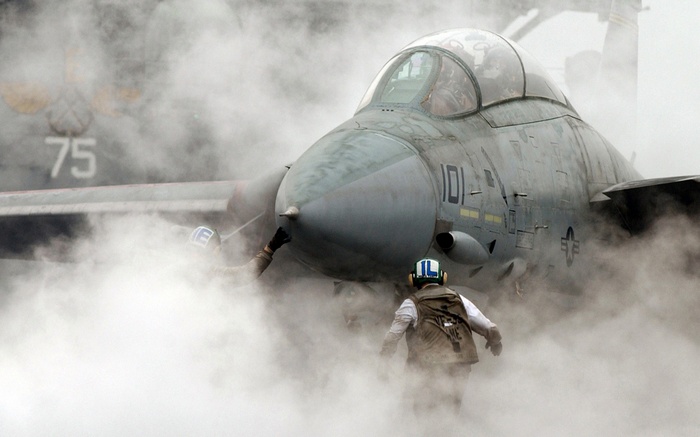 Grumman F-14 Tomcat on a foggy aircraft carrier deck