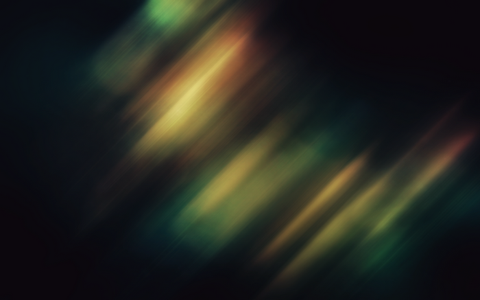 Abstract streaks of light with green and yellow hues