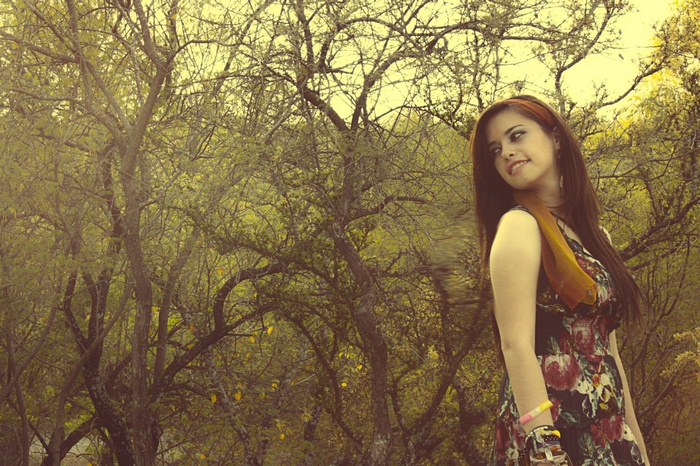 Woman with bracelets in a forest