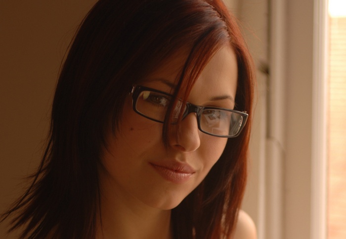 Iga Wyrwal wearing glasses