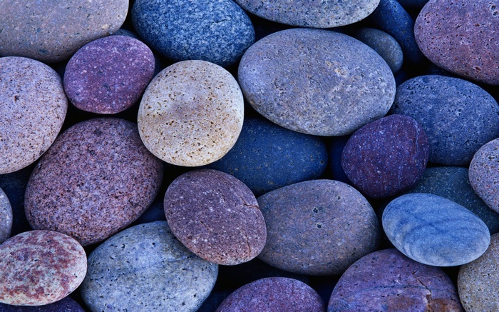 A close-up view of colorful, smooth stones.