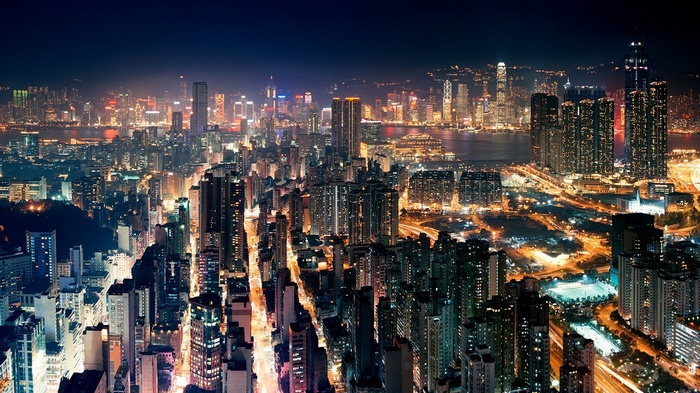 Hong Kong skyline at night with illuminated buildings