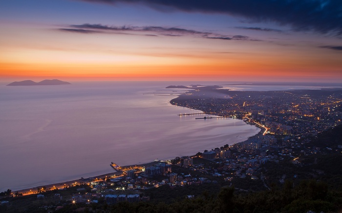 Vlore, Albania cityscape at sunset with islands in the sea