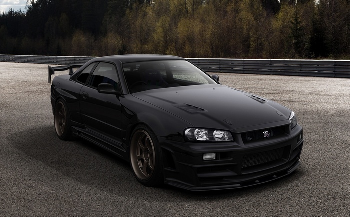 Black Nissan Skyline GT-R on a Racetrack